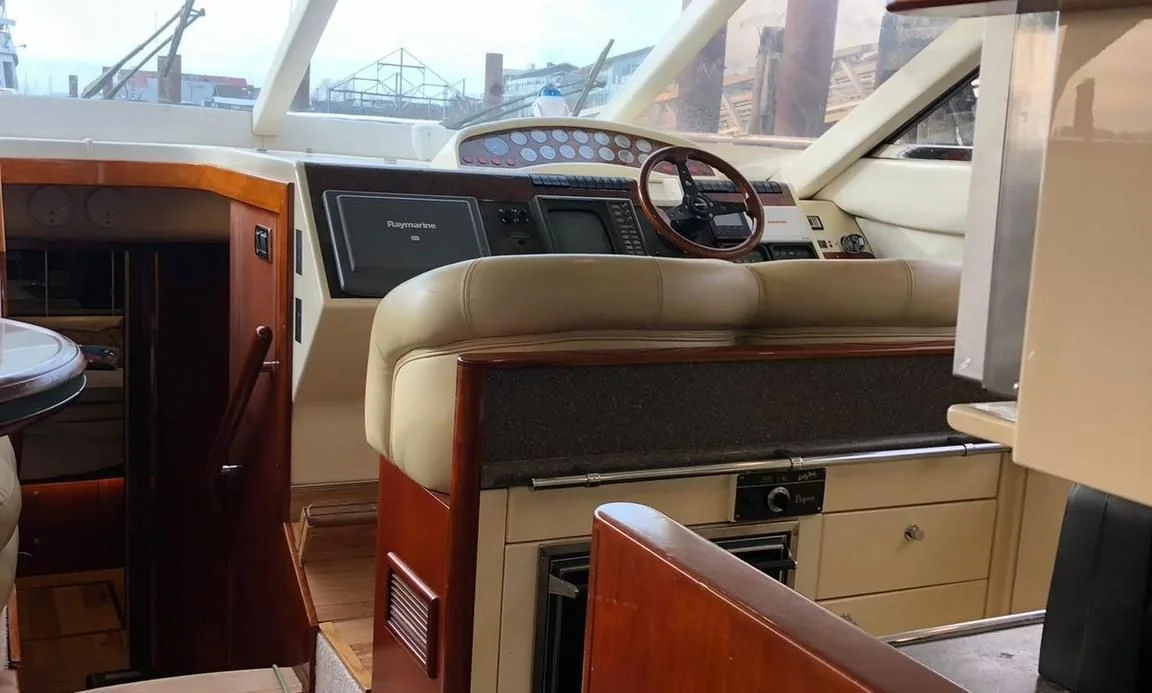 Main helm and navigation station aboard the Fairline Celeste yacht