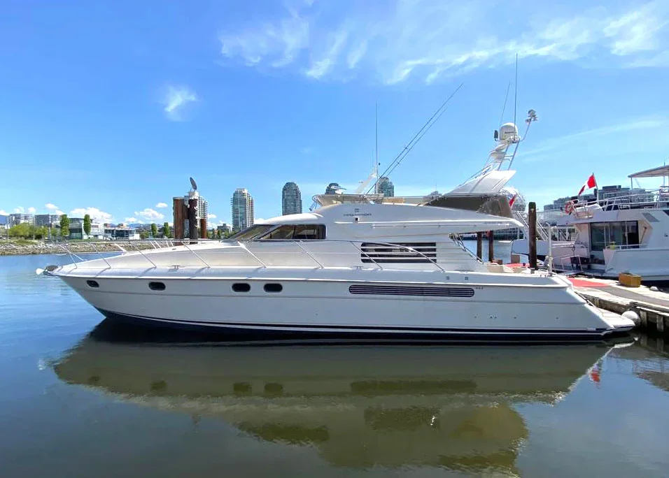 Full side profile of the Fairline Celeste yacht at a Vancouver marina